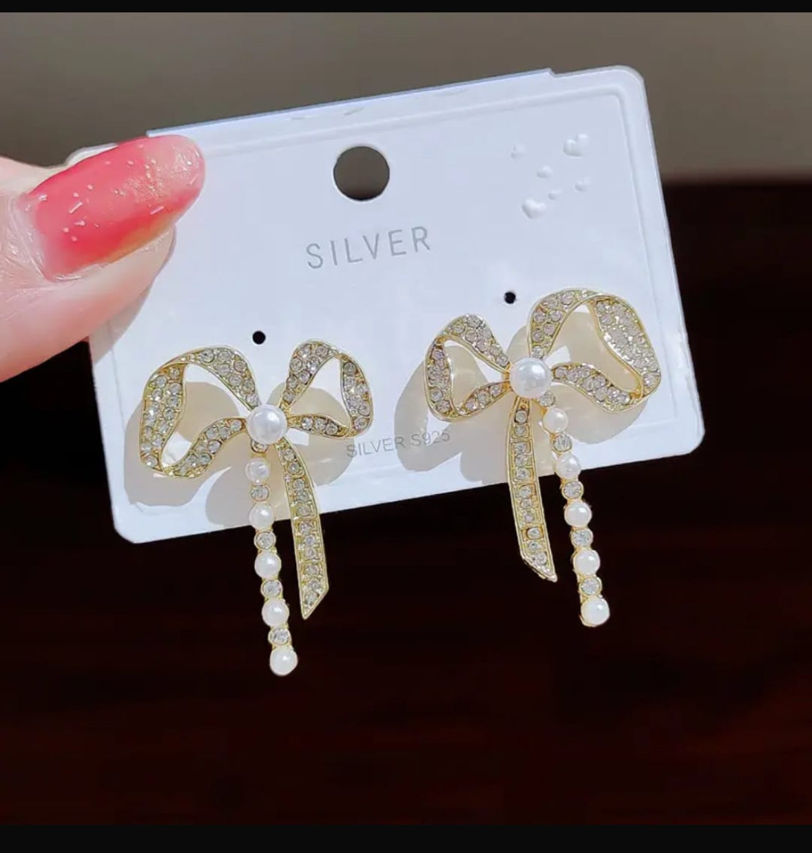 Bow shape pearl earrings
